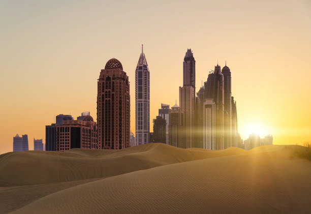 puesta de sol sobre la ciudad moderna - qatar fotografías e imágenes de stock