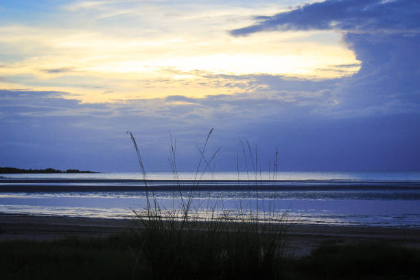 Sunset over quiet beach in far north Queensland, Australia stock photo