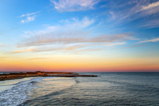 Sunset over the Mediterranean Sea, close to Aigues Mortes in Gard, Southern France. stock photo