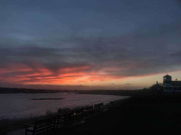 Sunset over the mouth of the River Tyne, England Sunset over the mouth of the River Tyne, England jay barker stock pictures, royalty-free photos & images