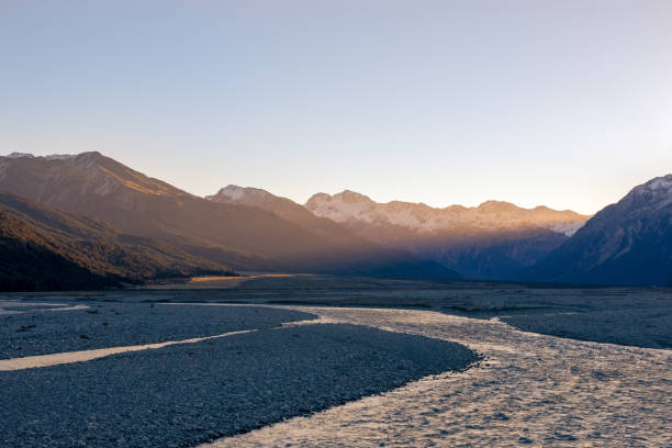 Sunset over Waimakariri River, South Island, New Zealand Sunset over Waimakariri River, South Island, New Zealand high country stock pictures, royalty-free photos & images