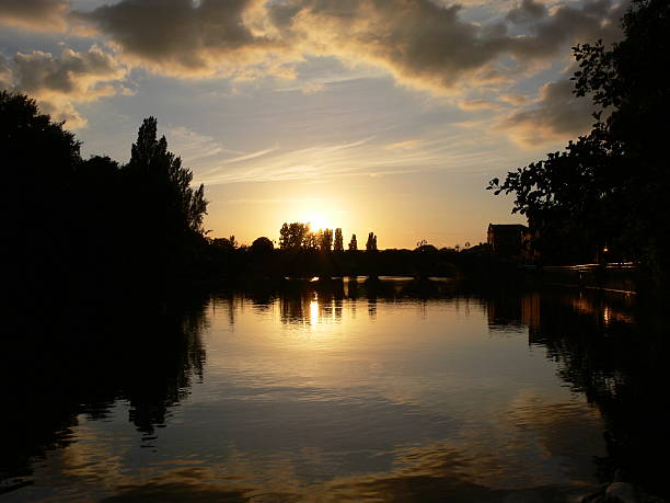 Sunset over Worcester Bridge This was taken in Worcester on the river seven overlooking the Worcester Bridge as the sun was setting normalisaverage stock pictures, royalty-free photos & images