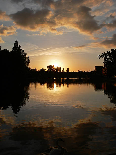 Sunset over Worcester Bridge Portrait This was taken in Worcester on the river seven overlooking the Worcester Bridge as the sun was setting in portrait. normalisaverage stock pictures, royalty-free photos & images