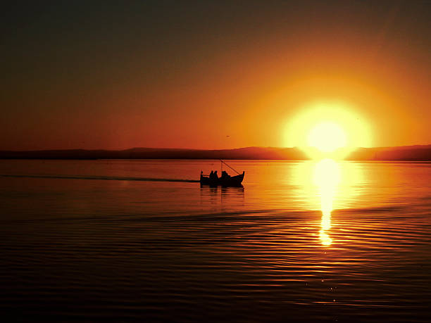 Sunset Sunset in the lake albufera stock pictures, royalty-free photos & images