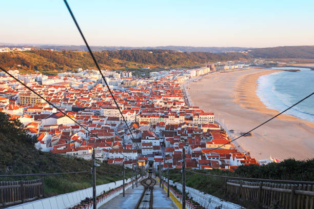 vista del tramonto dalla funicolare a nazare in portogallo - nazaré foto e immagini stock