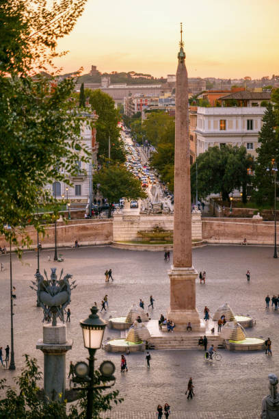 A sunset view of Piazza del Popolo seen from the Pincio Gardens in the historic heart of Rome stock photo