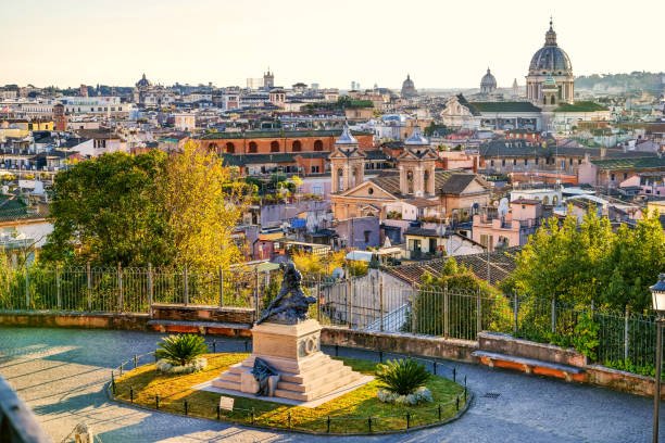 A sunset view of the historic center of Rome from the Pincio gardens viewpoint stock photo