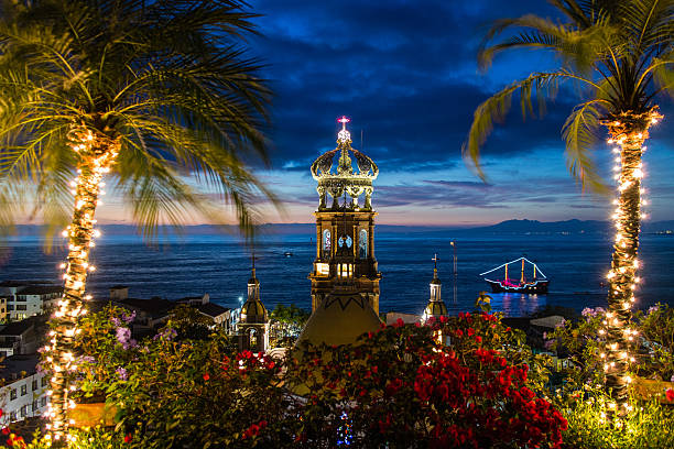 Sunset View, Puerto Vallarta, Mexico Sunset view over cathedral Our Lady of Guadalupe to the Pacific Ocean. puerto vallarta stock pictures, royalty-free photos & images