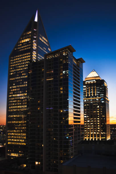 Sunset with the Bank of America and Duke Energy building in Charlotte, NC Charlotte NC USA. Nov 12 2020 :  Part of the financial uptown Charlotte skyline. bank of america stock pictures, royalty-free photos & images