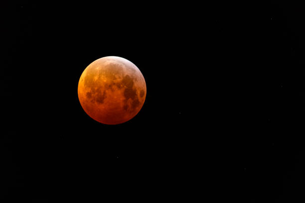 Super blood wolf moon lunar eclipse of January 2019 The super blood wolf moon lunar eclipse of January 2019 in the dark night sky. blood moon stock pictures, royalty-free photos & images