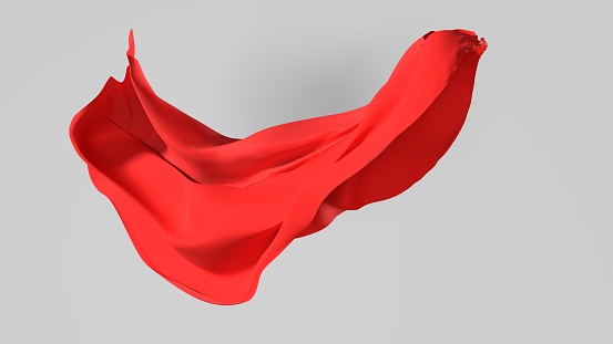 Superhero red capes are hanging and turning on white background for Halloween and superpower concept. Easy to crop for all your social media and design need with copy space.