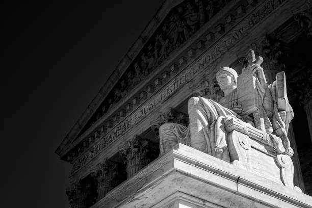 Supreme Court 16 A summer day in front of the US Supreme Court Building in Washington, DC. supreme court stock pictures, royalty-free photos & images