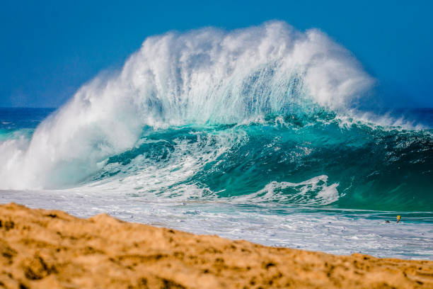 Surf at Bonzai Pipeline on Oahu's North Shore stock photo