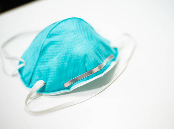Surgical mask N95 protecting TB and PM 2.5 medical equipment. Surgical mask N95 protecting TB and PM 2.5 medical equipment. n95 mask stock pictures, royalty-free photos & images