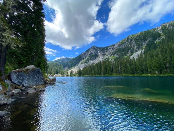 Surprise Lake Surprise Lake is one of many alpine lakes in the Alpine Lakes Wilderness of Washington State. alpine lakes wilderness stock pictures, royalty-free photos & images