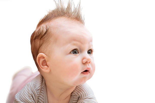 Surprised baby on white stock photo