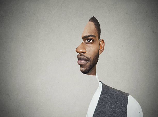 surrealistic portrait front with cut out profile of man surrealistic portrait front with cut out profile of a young man isolated on grey wall background eye photos stock pictures, royalty-free photos & images