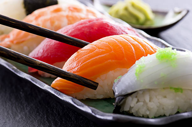 sushi on a plate stock photo
