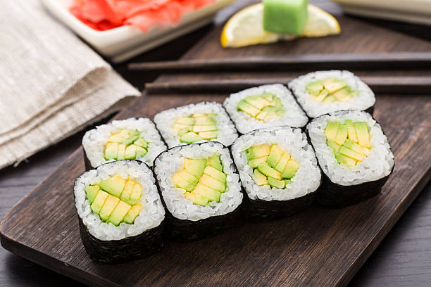 Sushi rolls with avocado stock photo