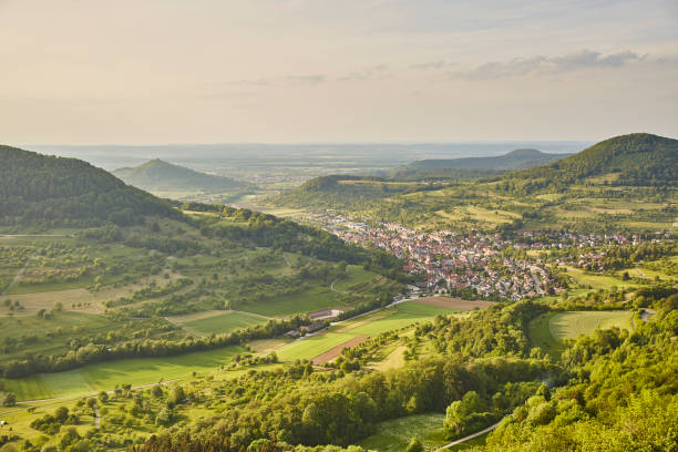 Swabian Alb Beautiful View Hilly Landscape green village horizon cloudscape baden württemberg stock pictures, royalty-free photos & images