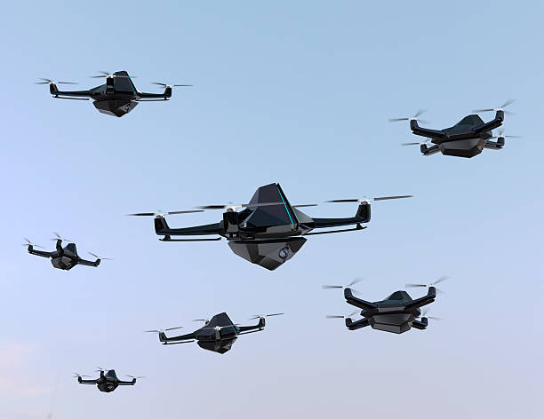 Swarm of drones flying in the sky Swarm of security drones with surveillance camera flying in the sky. 3D rendering image swarm of insects stock pictures, royalty-free photos & images