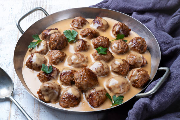 Swedish meatballs in a pan Meatballs in a pan with cream sauce sweden stock pictures, royalty-free photos & images