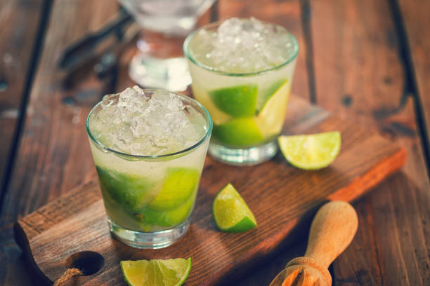 Sweet and Refreshing Drink Caipirinha Cocktail Sweet and refreshing Caipirinha national cocktail from Brazil made with lime,ice, sugar, and a sugarcane liquor alcohol drink stock pictures, royalty-free photos & images