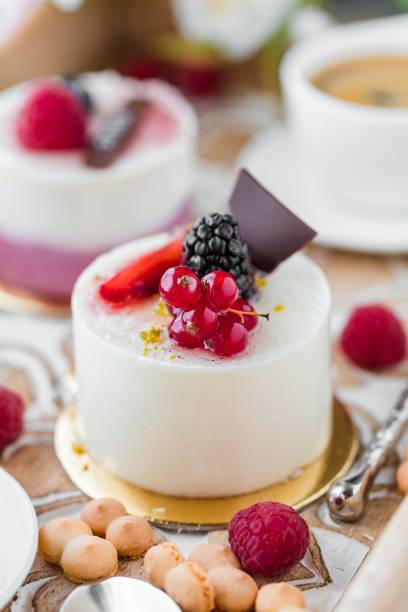 Sweet cakes with berries on table close-up stock photo