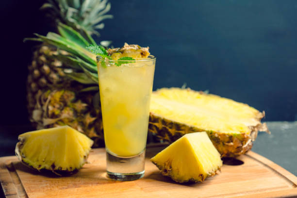 Sweet cocktail with pineapple and rum stock photo