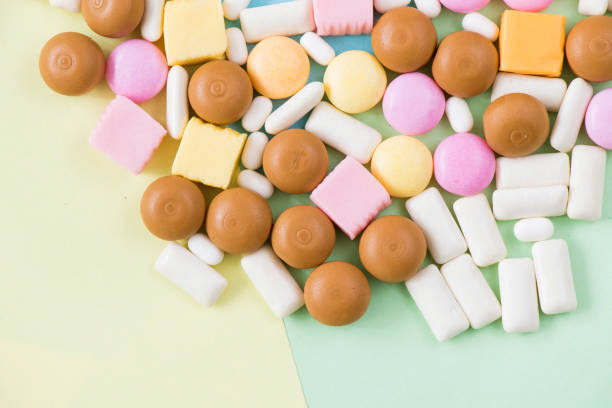 Sweet colorful confectionery, candy on the color background stock photo