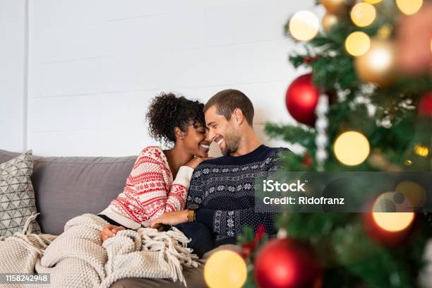 Sweet couple embracing during christmas