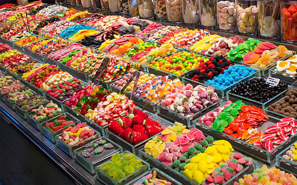Sweet display on a market in Barcelona A colourful sweet display on a market in Barceona pick and mix stock pictures, royalty-free photos & images