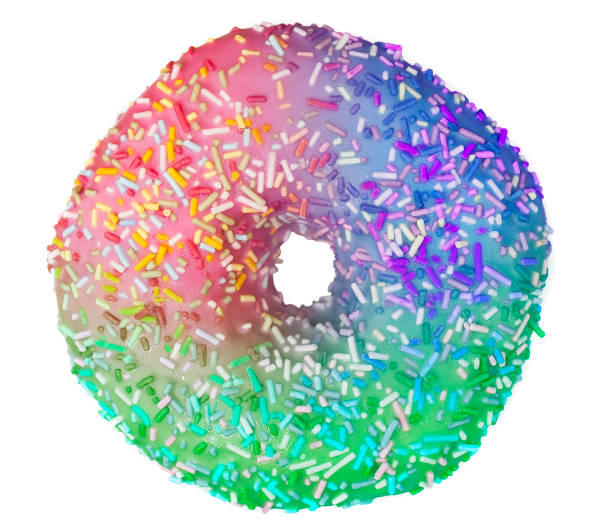 sweet donut in rainbow colors, tasty food or dessert isolated stock photo