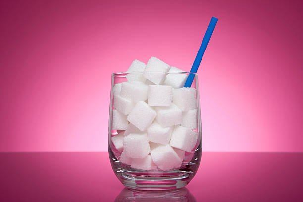 Sweet drink Glass filled with sugar sugar food stock pictures, royalty-free photos & images