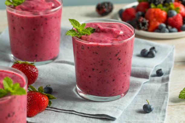 Sweet Homemade Healthy Berry Smoothie Sweet Homemade Healthy Berry Smoothie with Blueberries Blackberries and Strawberries smoothie stock pictures, royalty-free photos & images