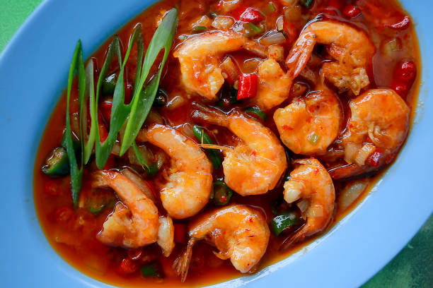 Sweet sour shrimp Delicious Udang asam manis or sweet and sour shrimp. traditional food from indonesia. Top View udang stock pictures, royalty-free photos & images