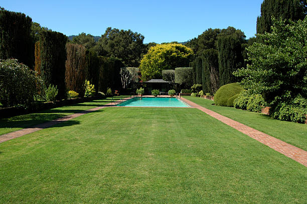 swimming pool in formal garden Swimming pool in formal garden. Filoli, Woodside, California. National Trust for Historic Preservation. California Registered Historical Landmark 907. yard grounds stock pictures, royalty-free photos & images