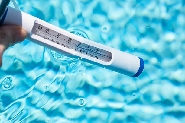 Swimming pool thermometer stock photo