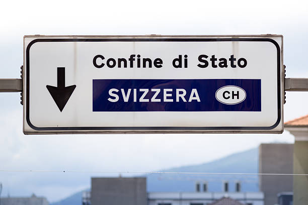 Switzerland and Italy customs road sign stock photo