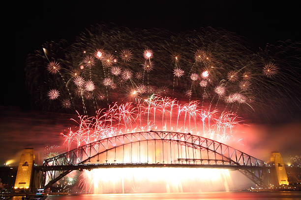 Sydney Harbour Bridge Fireworks - New Year 2010 An impressive display of red and gold as Sydney welcomes 2010! 2009 stock pictures, royalty-free photos & images