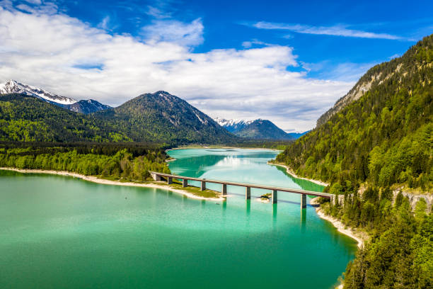 Sylvenstein See Lake Reservoir Bavaria Germany Alps Sylvenstein See Lake Reservoir Bavaria Germany Alps May river isar stock pictures, royalty-free photos & images