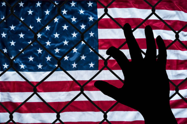 A symbolic representation of immigrants and the united states of america stock photo