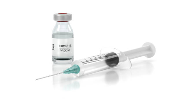 Syringe and Bottles on white background stock photo