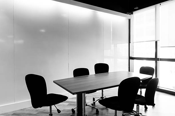 Table and chairs in a conference room.black and white tone.