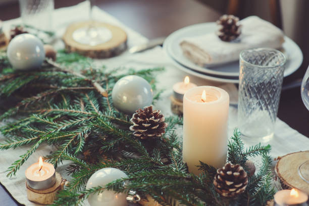 Table setting for celebration Christmas and New Year Holidays. Festive table at home with rustic details stock photo