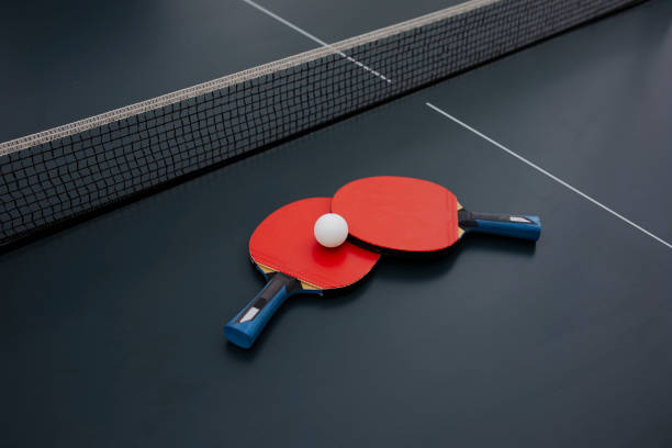 Table Tennis Equipment Red rackets and ping pong ball for table tennis. table tennis stock pictures, royalty-free photos & images