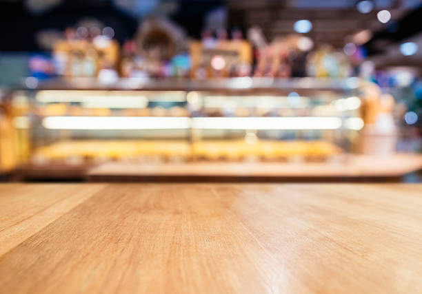 Table Top Counter with Blurred Bakery display shelf stock photo