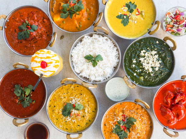 Table top view of Indian food. Table top view of authentic Indian food. indian food stock pictures, royalty-free photos & images