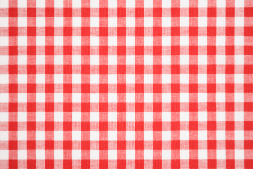 Tablecloth made of linen with red and white pattern.Perfect underground/background to put your dish or steak on.can be found in every kind of restaurant.