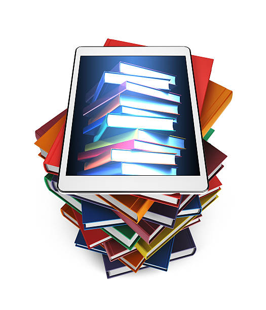 Tablet with the image of books on stack of books stock photo